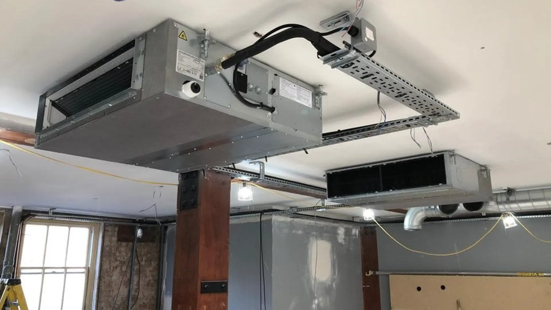 Ducted air conditioning system installation for large commercial buildings