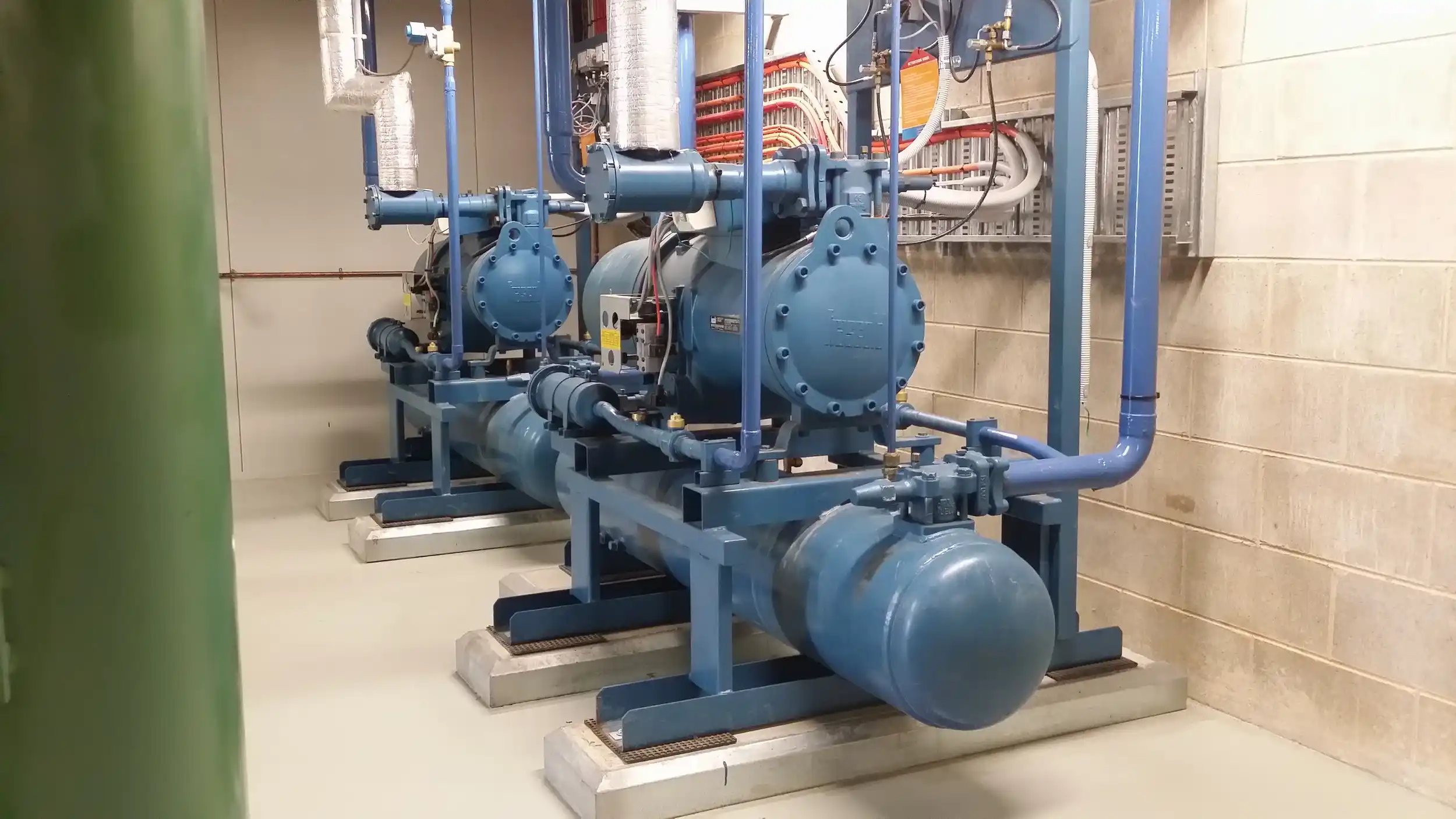 Commercial plant room showcasing Catalyst Air Installation Service Refrigeration setup with high-capacity equipment.